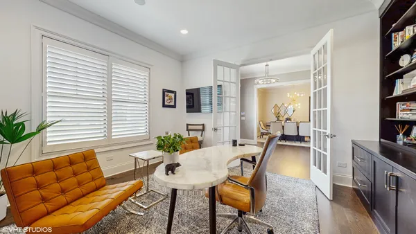 a workspace with furniture and window