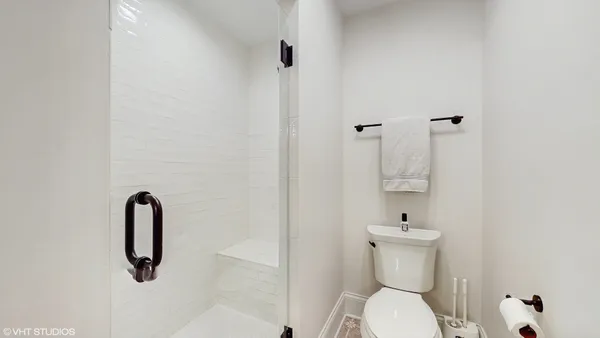 a view of cabinets with wooden floor
