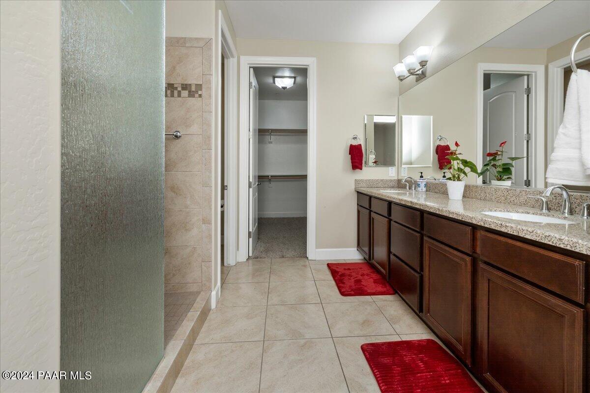 1478 Range View Circle Prescott Valley, AZ 86314 - Photo 12 of 31 a bathroom with a sink vanity and mirror
