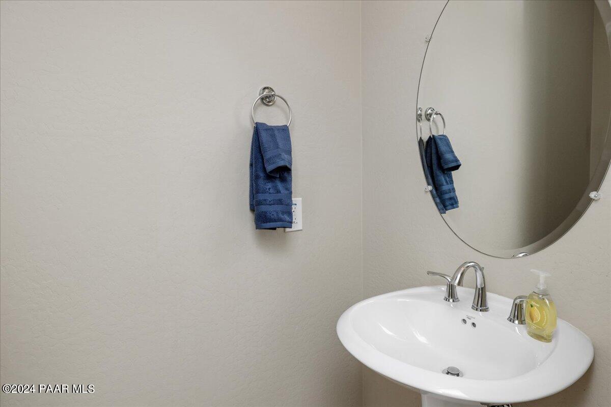 1478 Range View Circle Prescott Valley, AZ 86314 - Photo 15 of 31 a bathroom with a sink and mirror