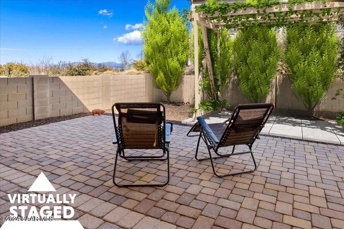 1478 Range View Circle Prescott Valley, AZ 86314 - Photo 21 of 31 a view of a terrace with furniture and a yard