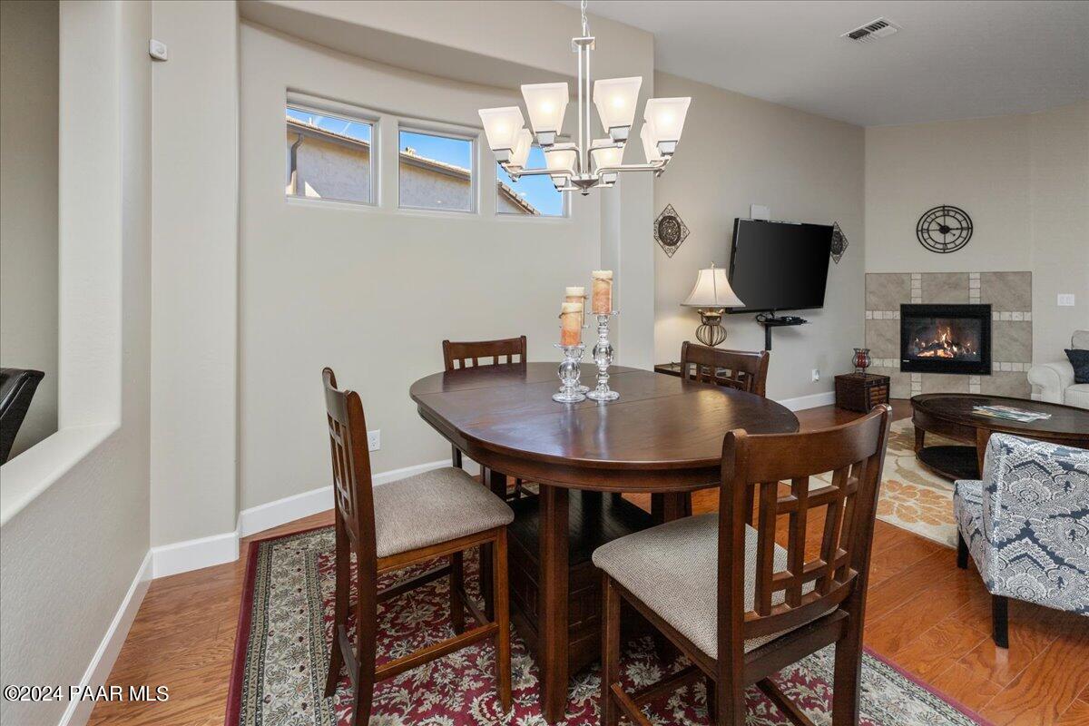 1478 Range View Circle Prescott Valley, AZ 86314 - Photo 9 of 31 a view of a dining room with furniture and a chandelier