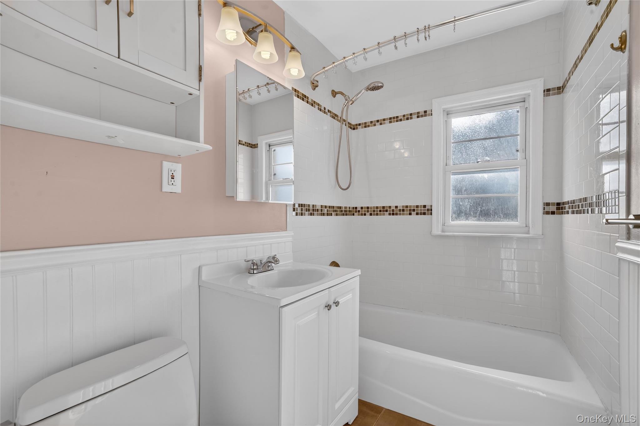 2 S Road, Unit 2P Harrison, NY 10528 - Photo 20 of 35 a bathroom with a sink a toilet and shower