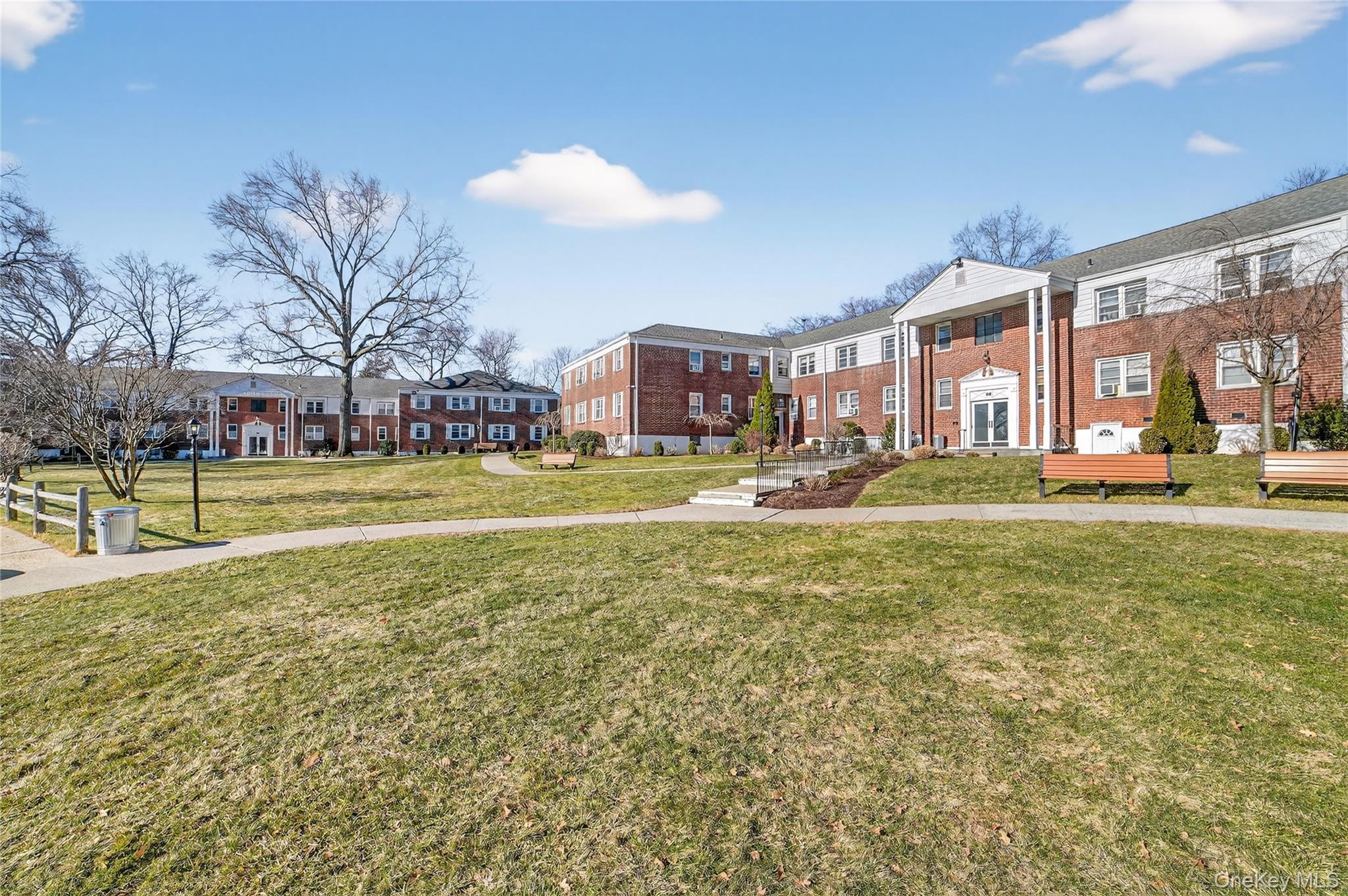 2 S Road, Unit 2P Harrison, NY 10528 - Photo 28 of 35 a view of a swimming pool with lawn chairs and a big yard