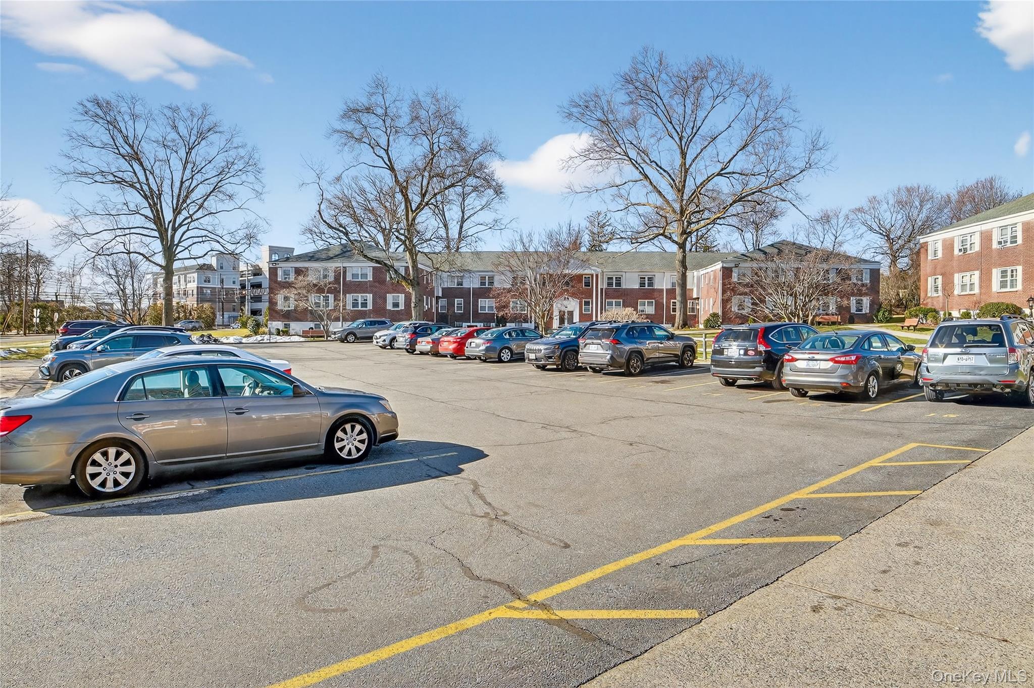 2 S Road, Unit 2P Harrison, NY 10528 - Photo 30 of 35 a cars parked on the side of a street