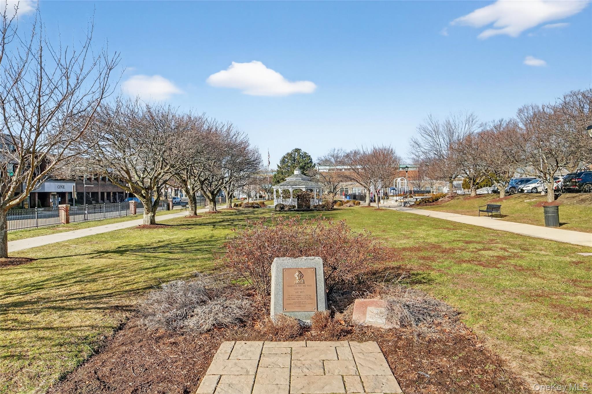 2 S Road, Unit 2P Harrison, NY 10528 - Photo 32 of 35 a view of a swimming pool with an outdoor space and seating area