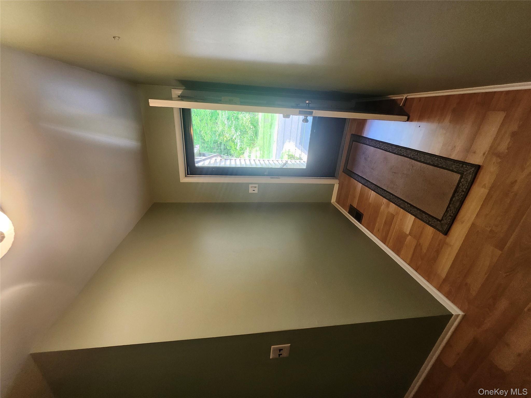 108 Village Road, Unit B Yorktown Heights, NY 10598 - Photo 2 of 42 Entryway featuring finished laminate floors and baseboards