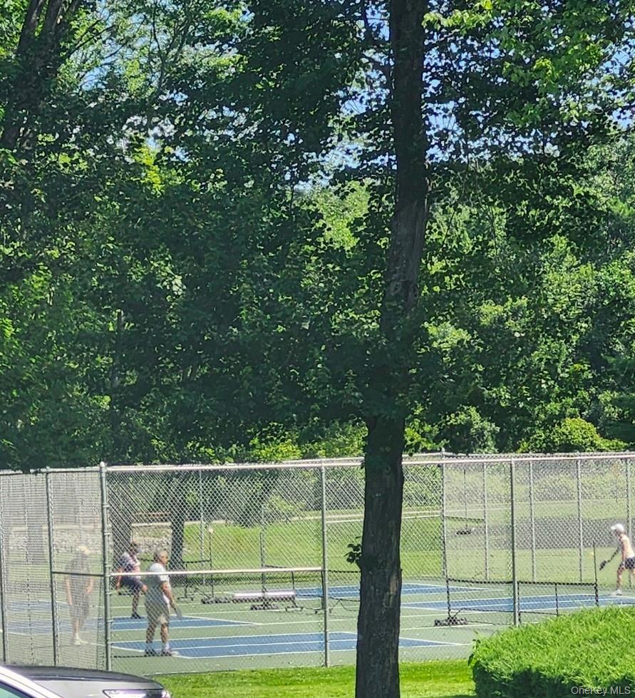108 Village Road, Unit B Yorktown Heights, NY 10598 - Photo 23 of 42 a view of a tennis court