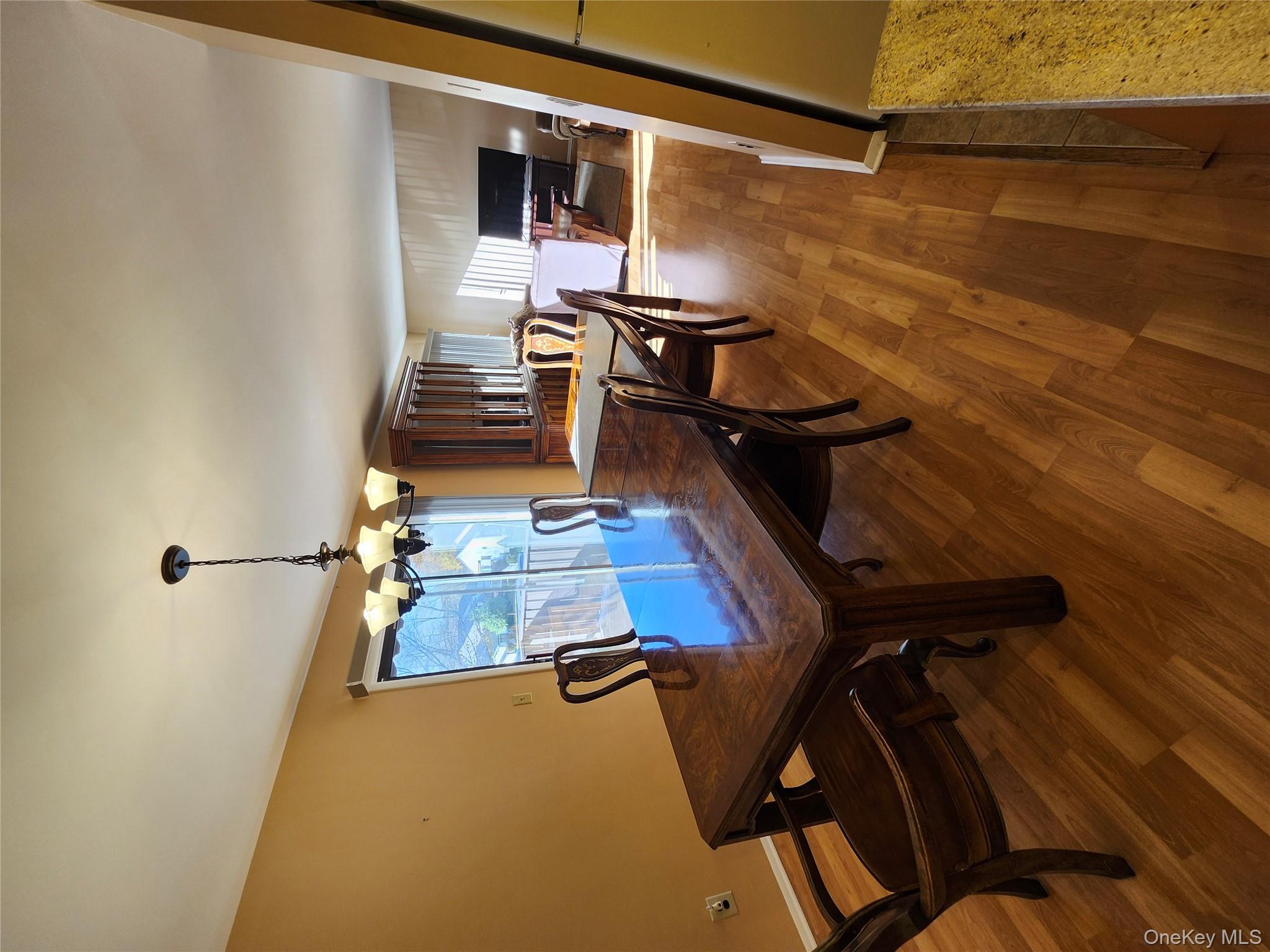 108 Village Road, Unit B Yorktown Heights, NY 10598 - Photo 25 of 42 a view of a dining room with furniture