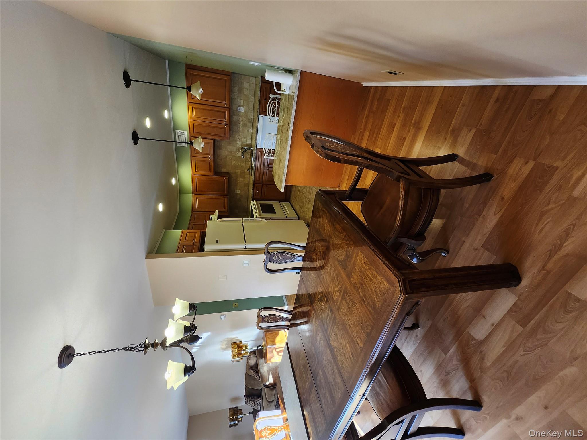 108 Village Road, Unit B Yorktown Heights, NY 10598 - Photo 27 of 42 a outdoor dining space with furniture and view of a projector