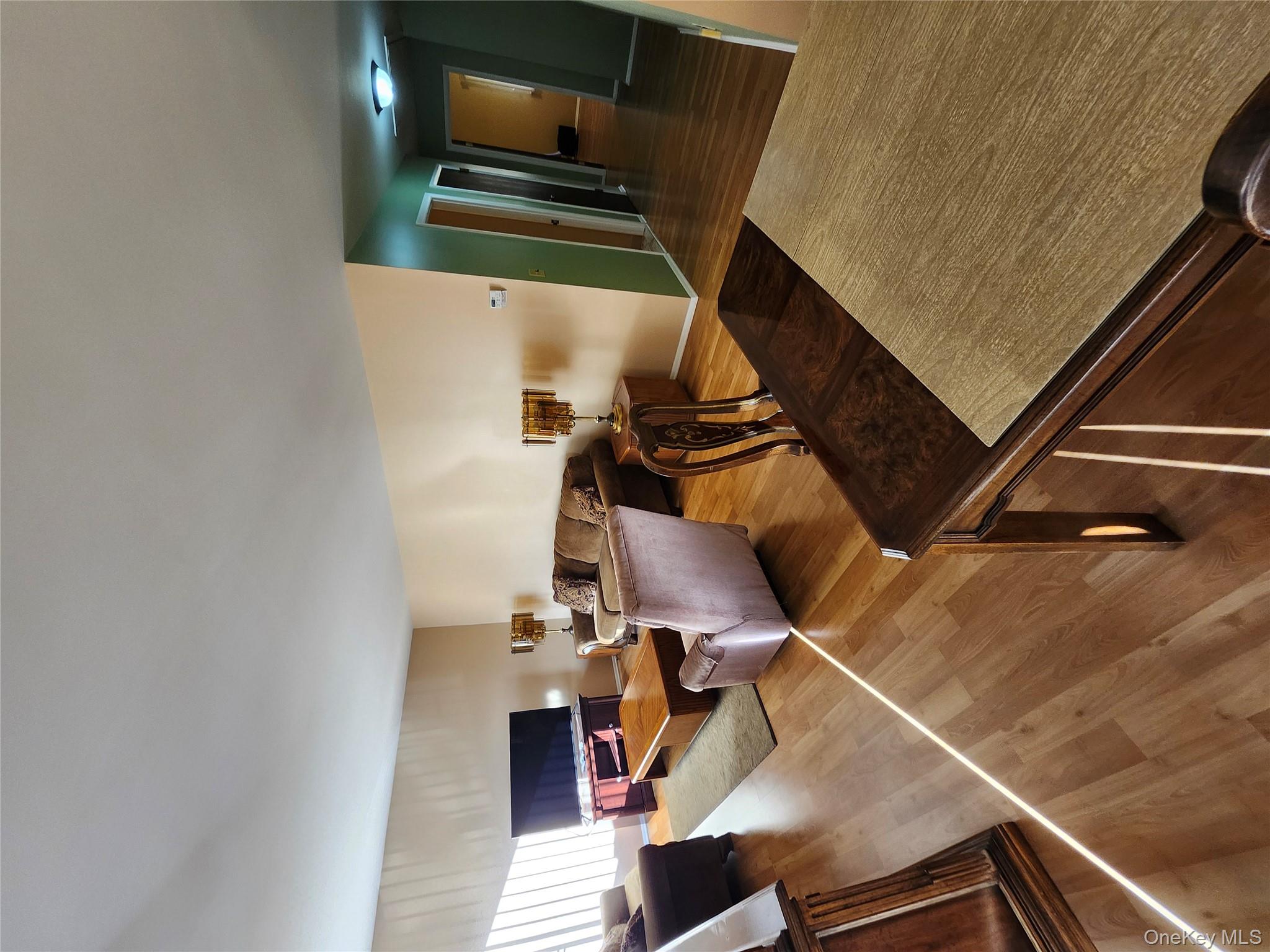 108 Village Road, Unit B Yorktown Heights, NY 10598 - Photo 32 of 42 a living room with furniture and a flat screen tv