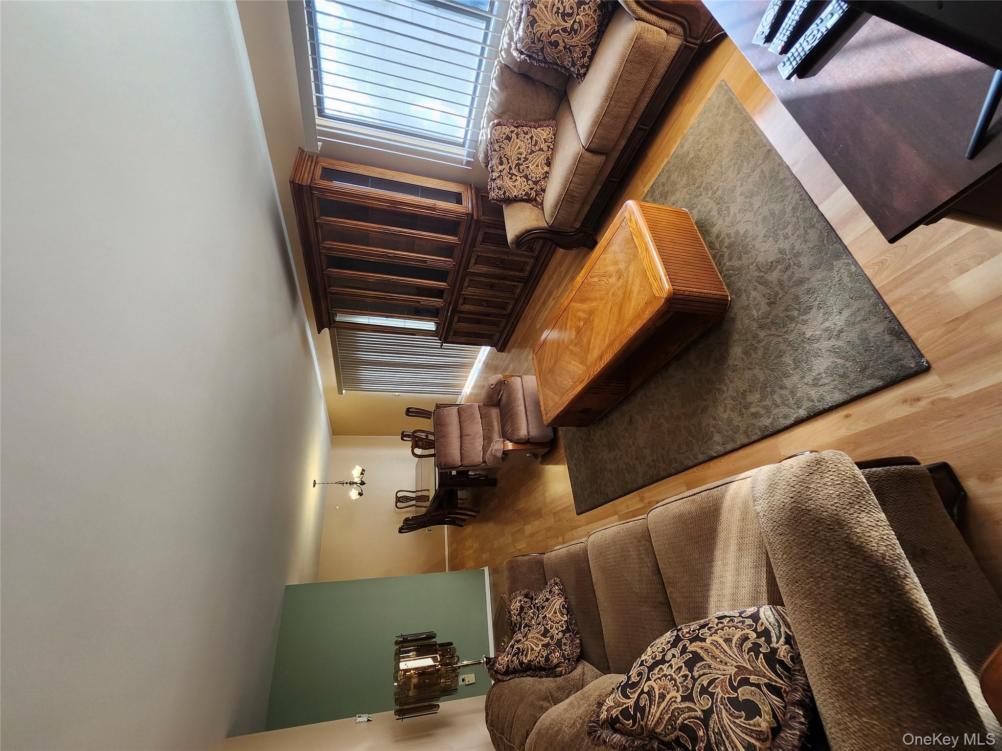 108 Village Road, Unit B Yorktown Heights, NY 10598 - Photo 38 of 42 a living room with furniture and a couch