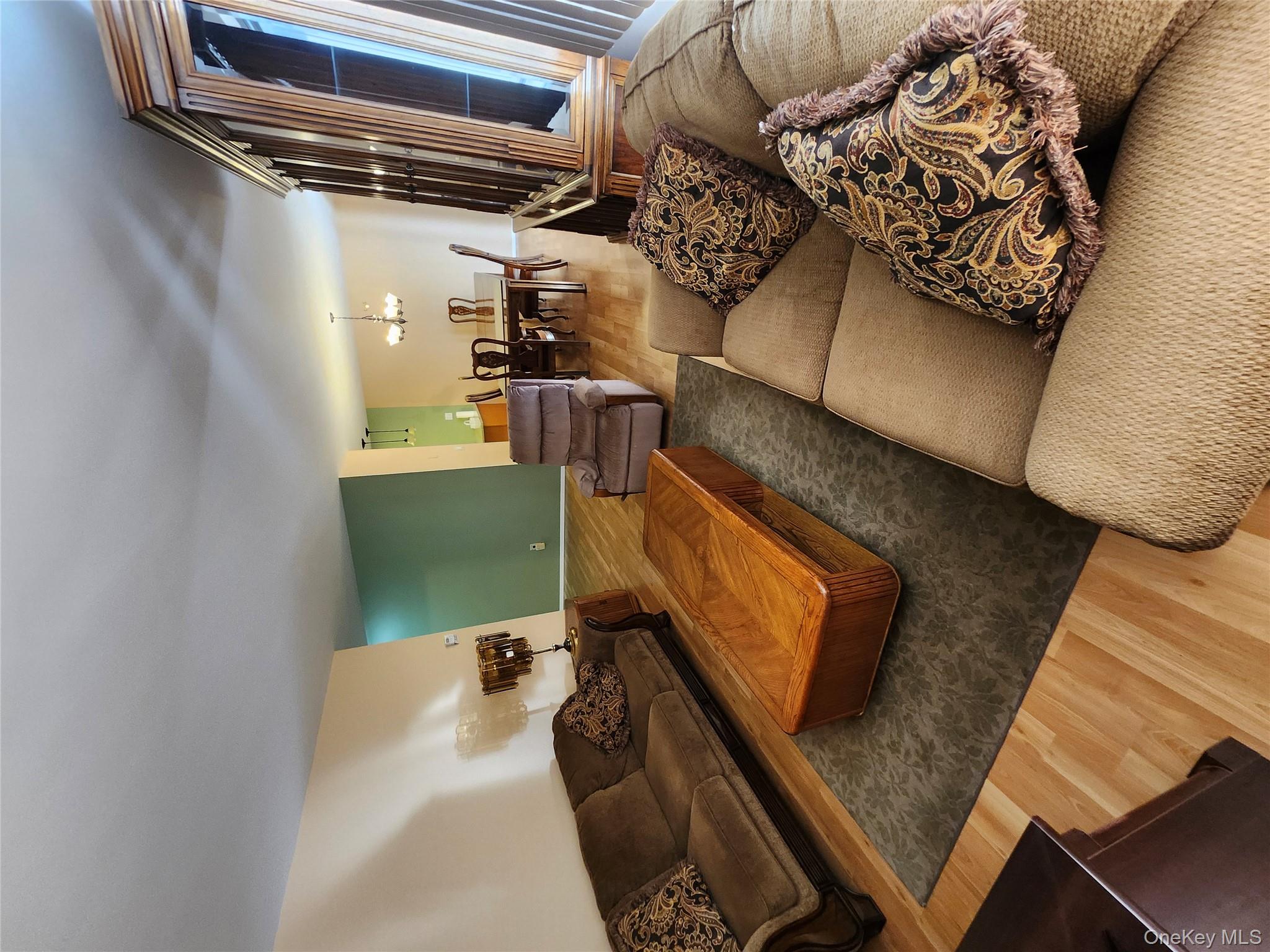 108 Village Road, Unit B Yorktown Heights, NY 10598 - Photo 40 of 42 a living room with furniture and a couch