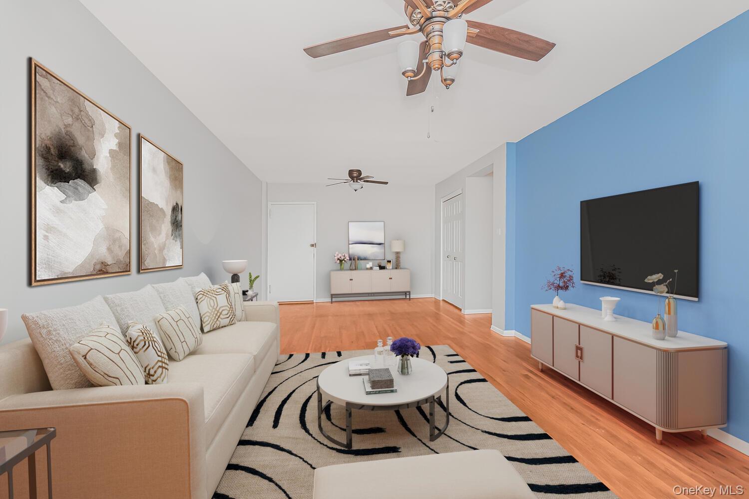 1110 Stadium Avenue, Unit 5F Bronx, NY 10465 - Photo 1 of 20 a living room with furniture and a flat screen tv