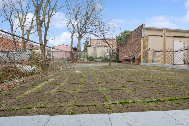a view of residential building with parking space