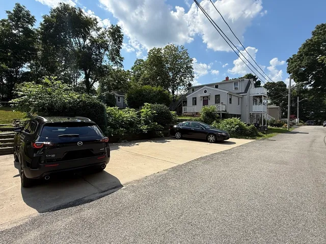 a car parked in front of a house