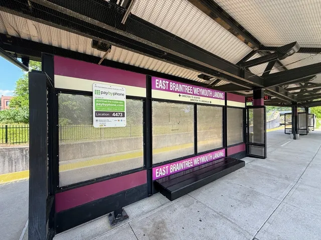 a building with an outdoor space and sitting area