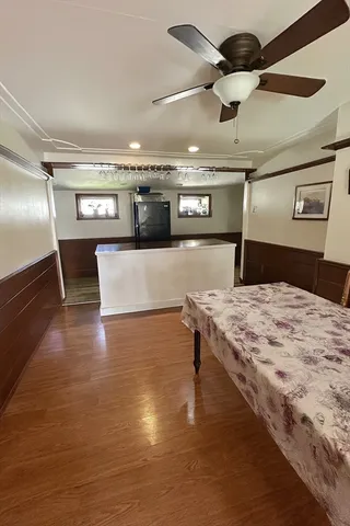 a kitchen with a stove and a refrigerator