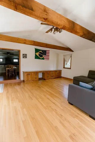a view of living room filled with furniture