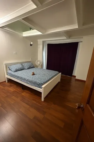 a room with pool table and chair