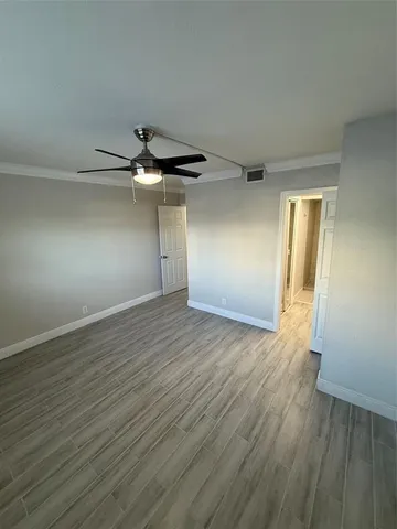 a bathroom with a double vanity sink and mirror