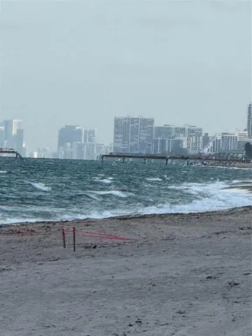 a view of a beach and a ocean view