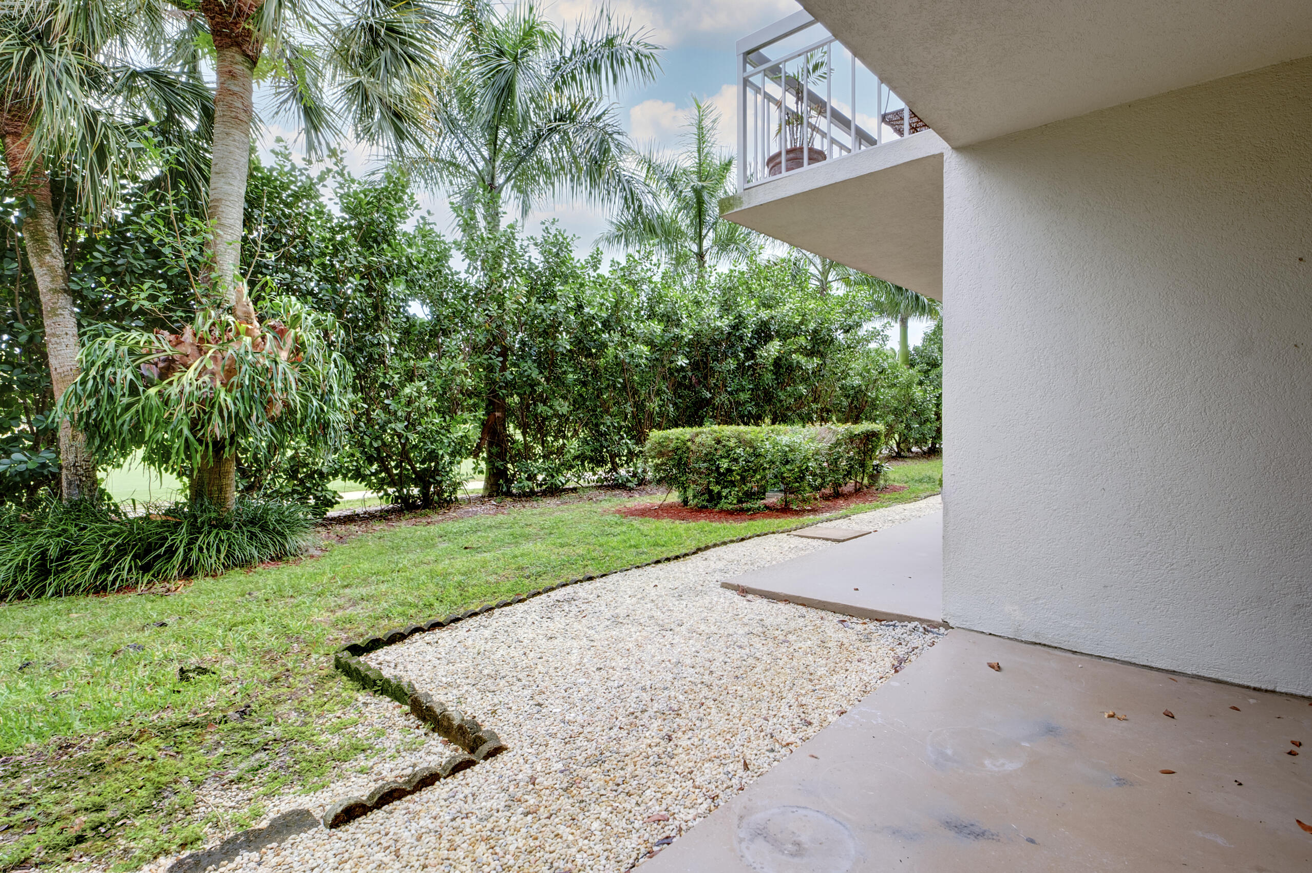 6145 Balboa Circle, Unit 103 Boca Raton, FL 33433 - Photo 23 of 31 a view of a backyard