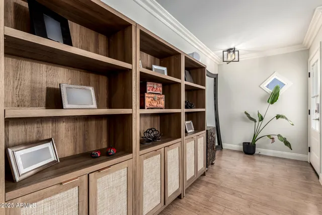 a view of cabinets and book shelf