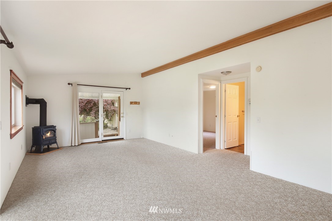 4030 Bay Road Ferndale, WA 98248 - Photo 17 of 36 a view of empty room with furniture and windows