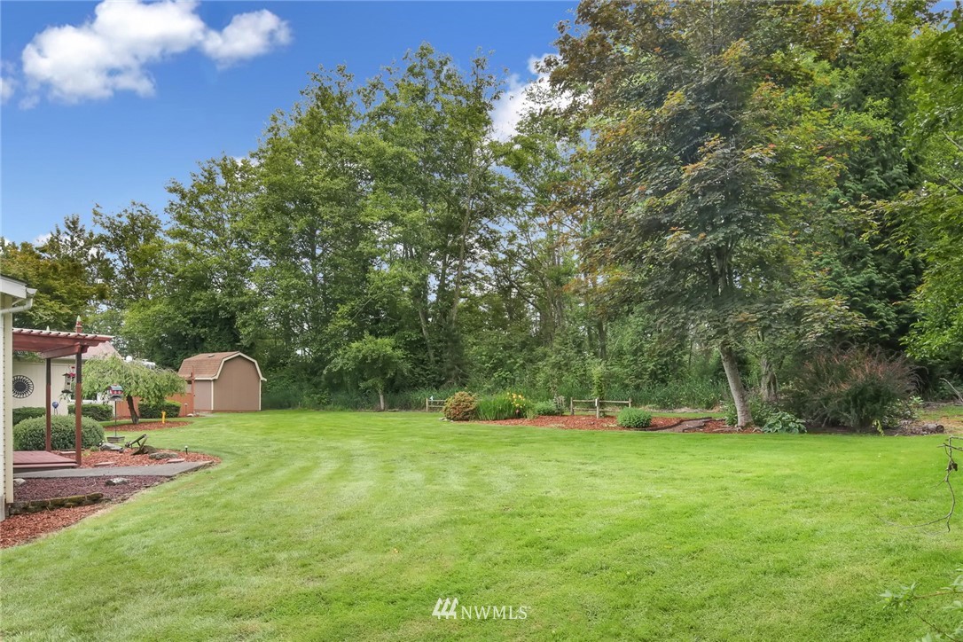 4030 Bay Road Ferndale, WA 98248 - Photo 31 of 36 a view of a garden with a slide