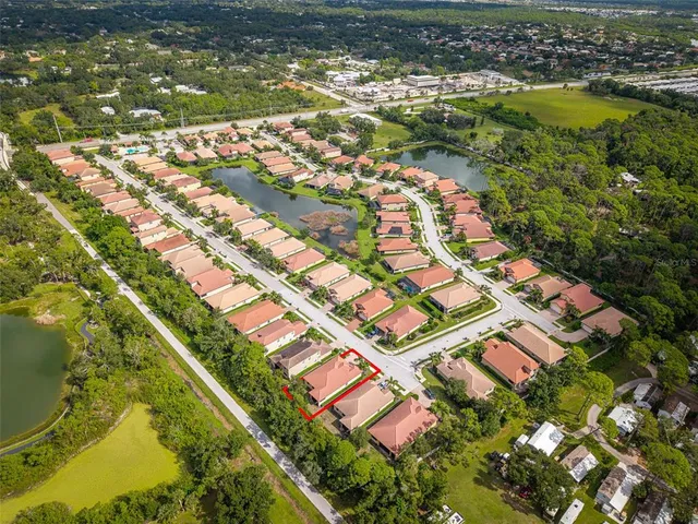 an aerial view of a house with a garden
