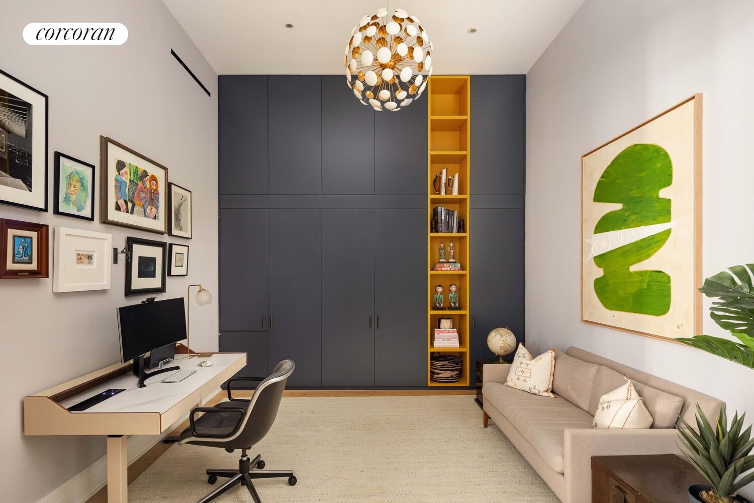 87 Leonard Street, Unit 2 Manhattan, NY 10013 - Photo 14 of 24 a workspace with furniture and a window