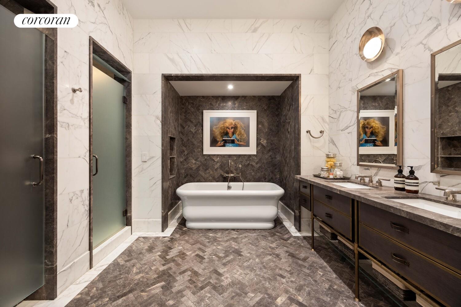 87 Leonard Street, Unit 2 Manhattan, NY 10013 - Photo 16 of 24 a bathroom with a sink a toilet and mirror