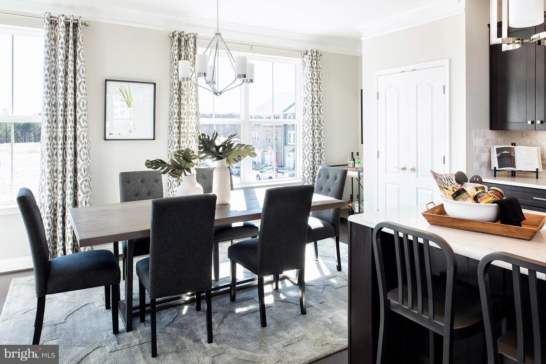 4100 Viewpath Road Ellicott City, MD 21043 - Photo 5 of 23 a view of a dining room with furniture window and outside view
