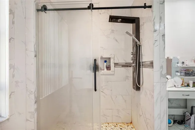 a kitchen with lots of counter top space and furniture