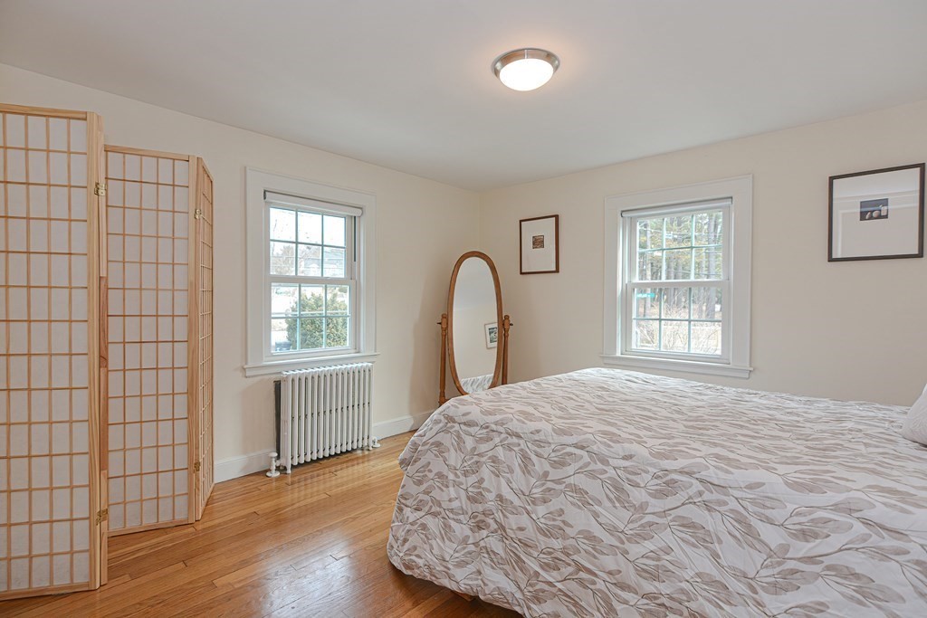 95 Southbourne Road Boston, MA 02130 - Photo 15 of 29 a bedroom with a bed and a window