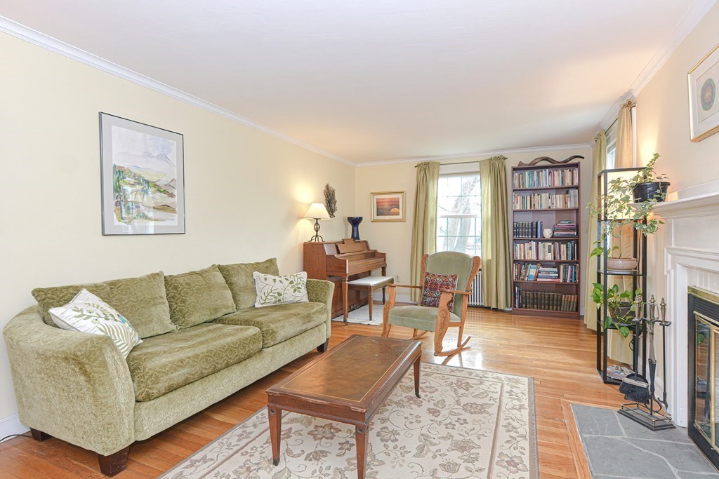 95 Southbourne Road Boston, MA 02130 - Photo 2 of 29 a living room with furniture and a large window