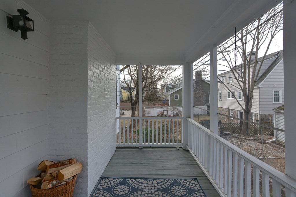95 Southbourne Road Boston, MA 02130 - Photo 21 of 29 a view of a porch with wooden floor and fence