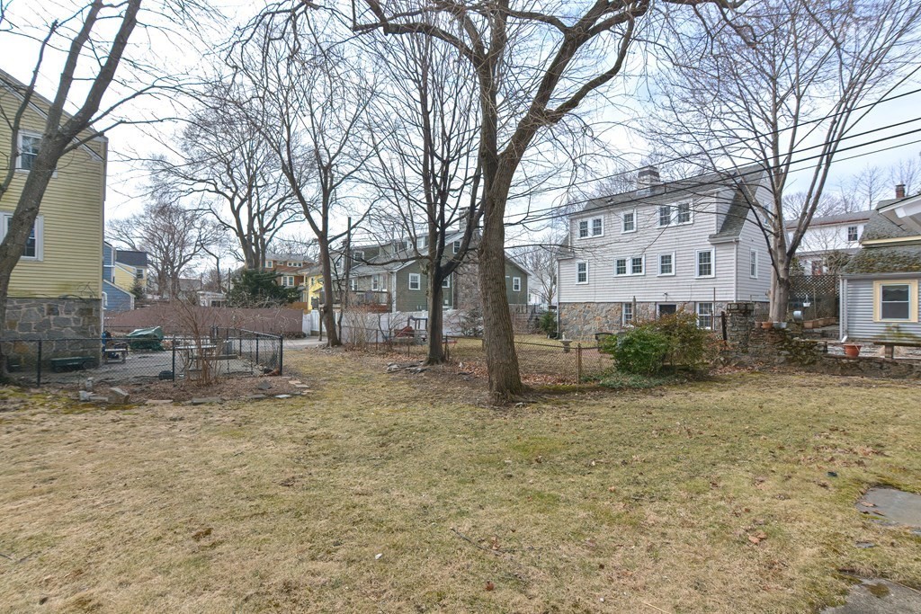 95 Southbourne Road Boston, MA 02130 - Photo 24 of 29 a view of a yard with a house and trees