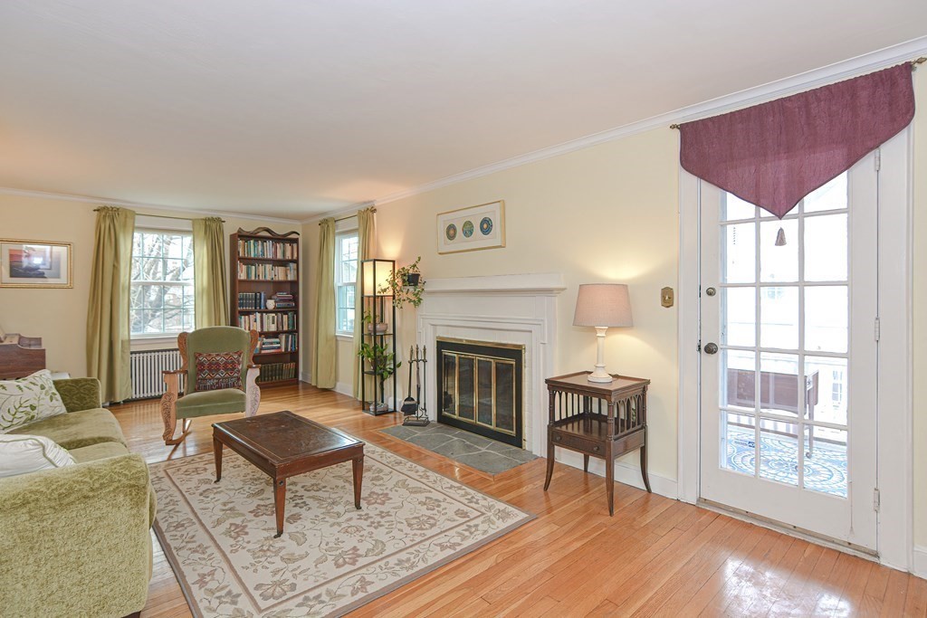 95 Southbourne Road Boston, MA 02130 - Photo 4 of 29 a living room with furniture and a fireplace