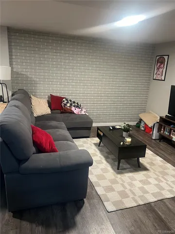 a living room with furniture and a couch