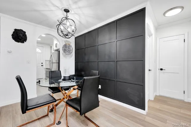 a view of workspace with wooden floor