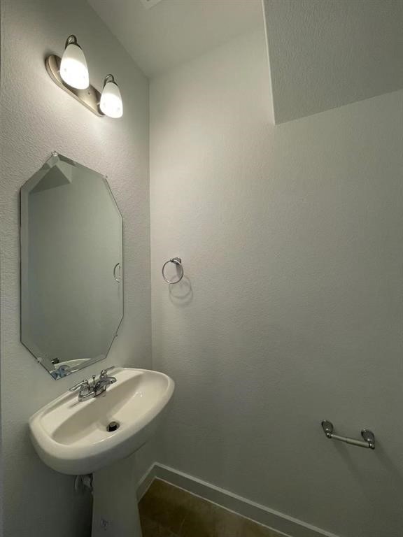815 Summer Village Way Rosenberg, TX 77469 - Photo 8 of 21 a bathroom with a sink and a mirror