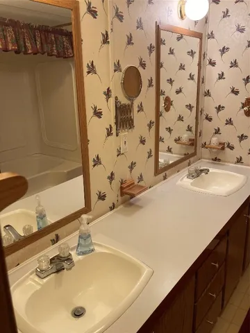 a bathroom with a sink and a tub