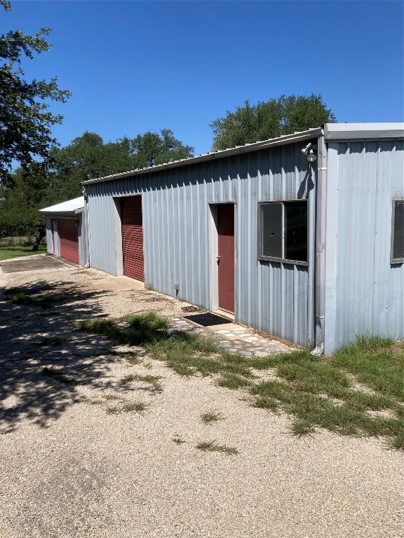 564 Cherry Springs Road Hunt, TX 78024 - Photo 17 of 29 a view of a house with a wooden fence