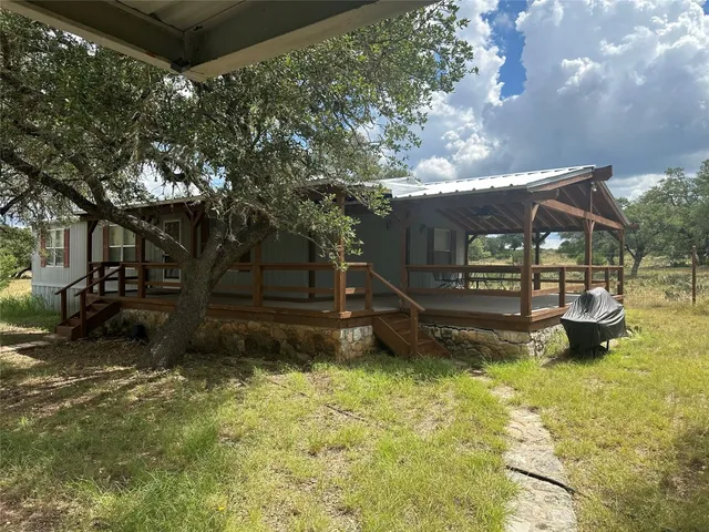 a view of a backyard with a garden