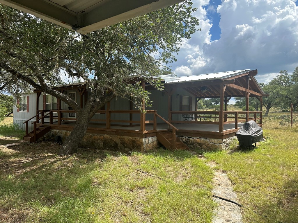 564 Cherry Springs Road Hunt, TX 78024 - Photo 9 of 29 a view of a backyard with a garden
