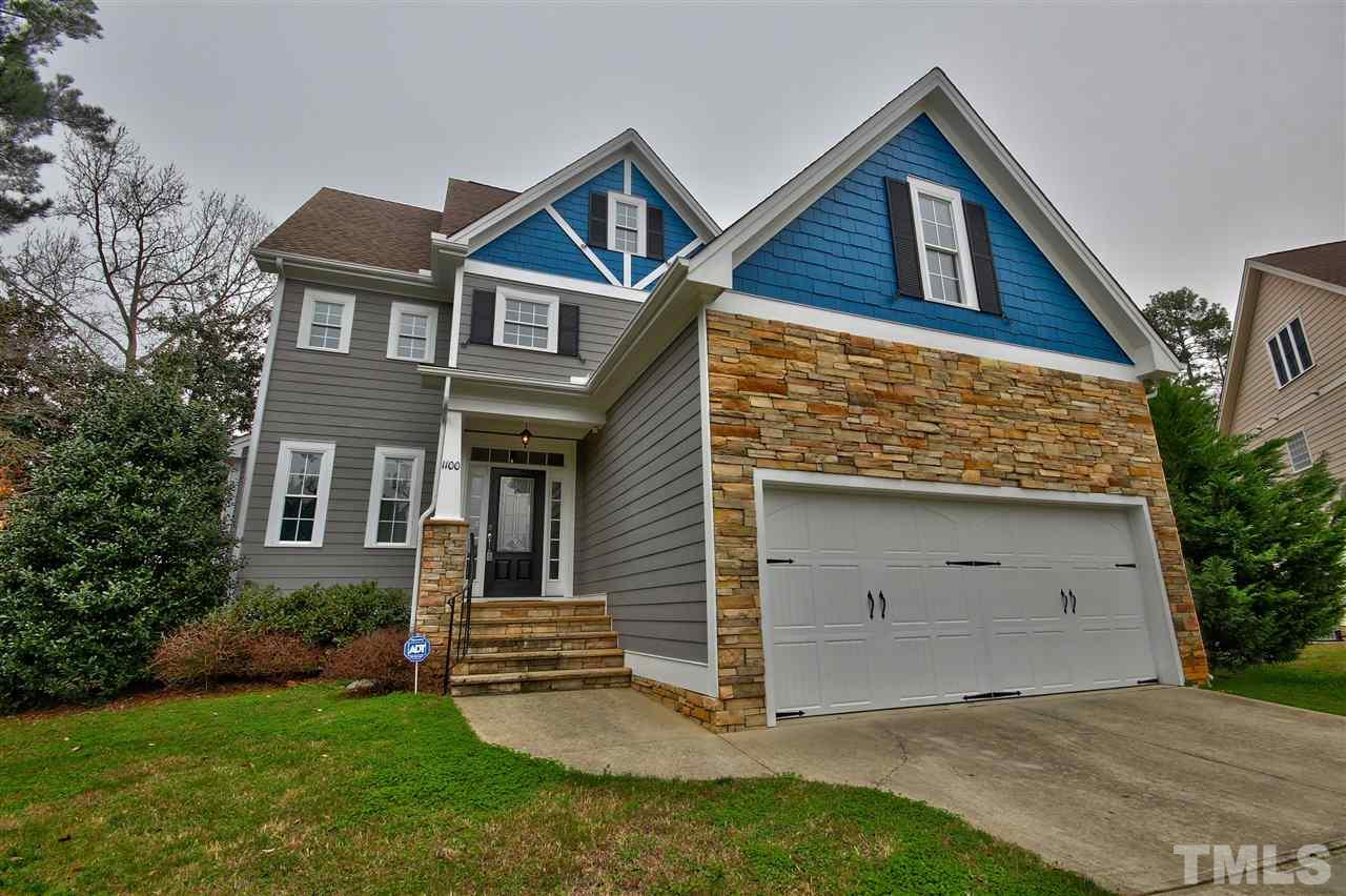 1100 Silas Ridge Court Raleigh, NC 27609 - Photo 1 of 24 a front view of a house with a yard