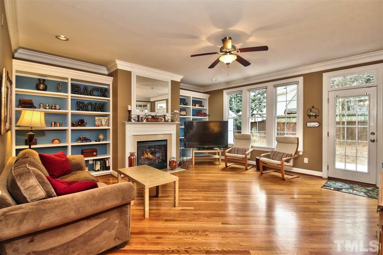 1100 Silas Ridge Court Raleigh, NC 27609 - Photo 3 of 24 a living room with furniture window and a flat screen tv