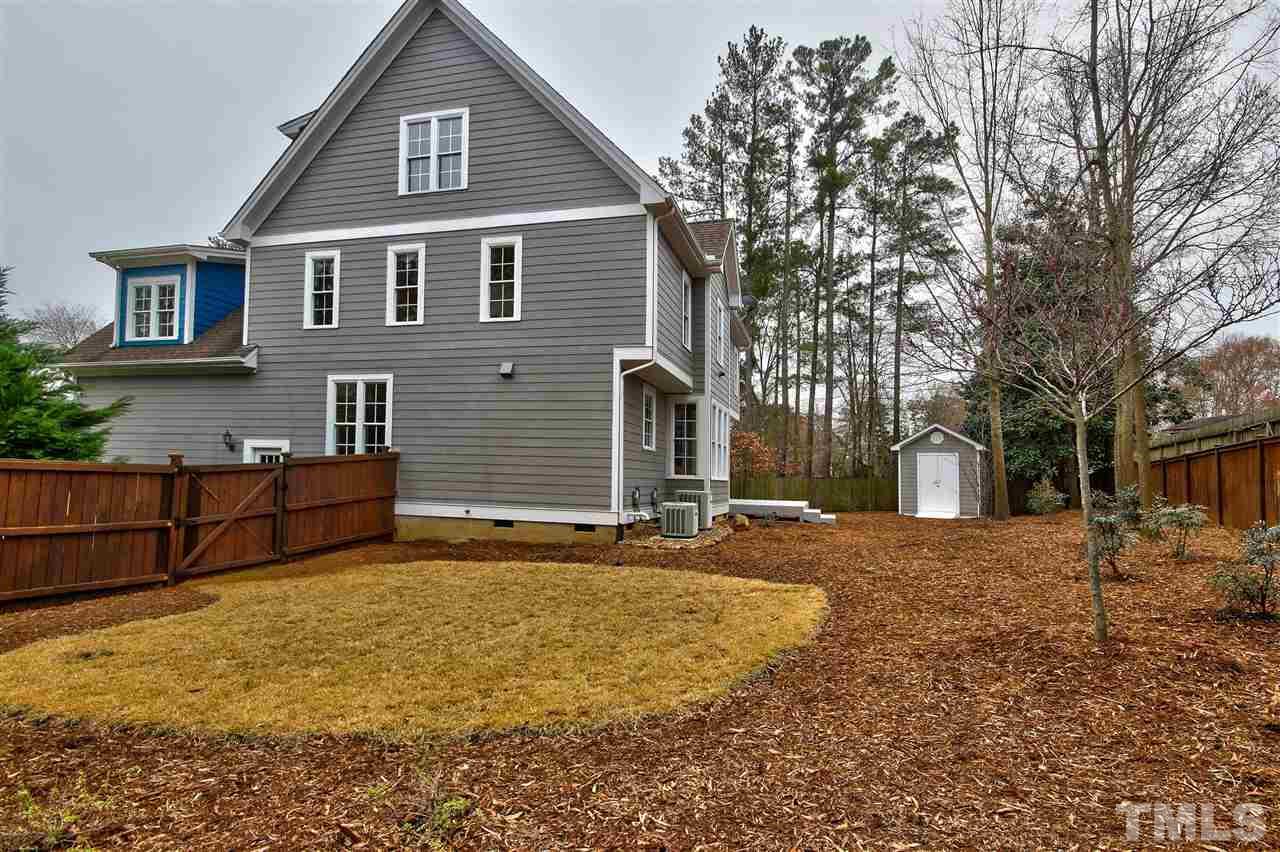 1100 Silas Ridge Court Raleigh, NC 27609 - Photo 22 of 24 a view of a house with a yard